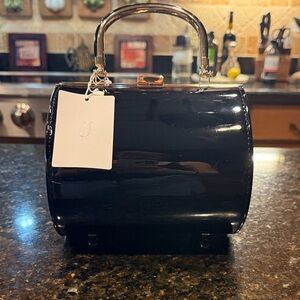 Elegant Black Clutch with Gold Handle